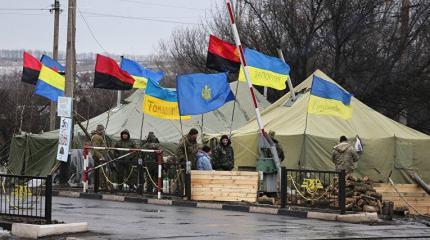 Украинские добровольцы убивают экономику страны